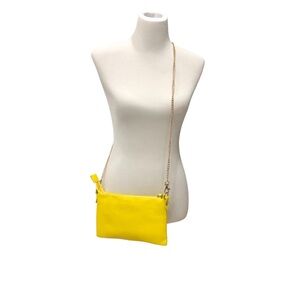 Charming Charlie bright yellow convertible small bag